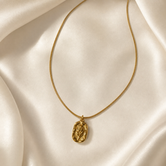 One necklace comprising a single strand of yellow-gold-coloured snake chain of fine gauge with a smooth, polished finish, suspended in a narrow U-shape with both upper ends running out of frame. Tracing from either end toward the centre, the chain is continuous and undecorated until the bottom centre, where one pendant hangs.