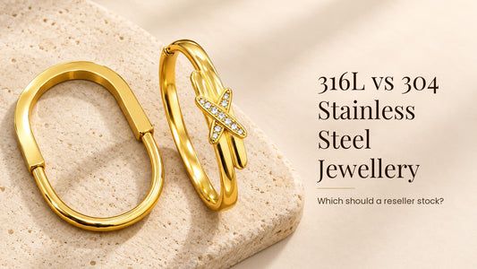 316L vs 304 Stainless Steel Jewellery. Two gold-tone stainless steel kada bracelets side by side on a pale cream stone slab