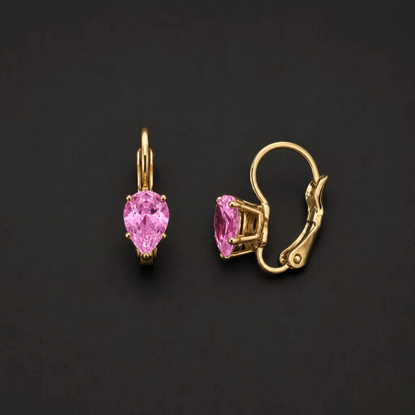 Gold-tone 304 stainless steel leverback earrings with a pink pear-cut crystal stone in a four-prong setting, a pair shown side by side, second view