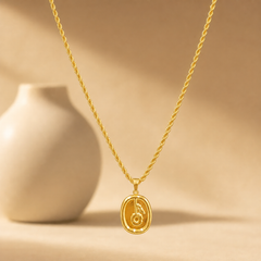 One necklace, a single strand of yellow-gold-colour metal with a polished, bright finish. The chain is a twisted rope chain of medium-fine gauge, one continuous strand with no branches. Its total run is approximately 25 times the width of the pendant, the largest component; no extender chain is visible, so no extender fraction can be stated. No working closure is visible in the image; the clasp area is partly obscured.