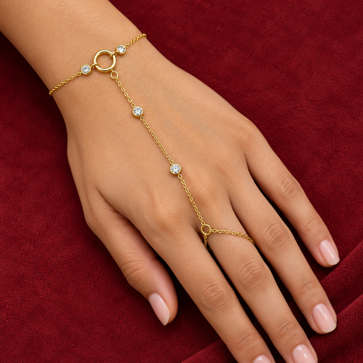 Gold-tone 304 stainless steel hand chain with bezel-set clear stones and a ring joined to a finger chain, worn on a hand